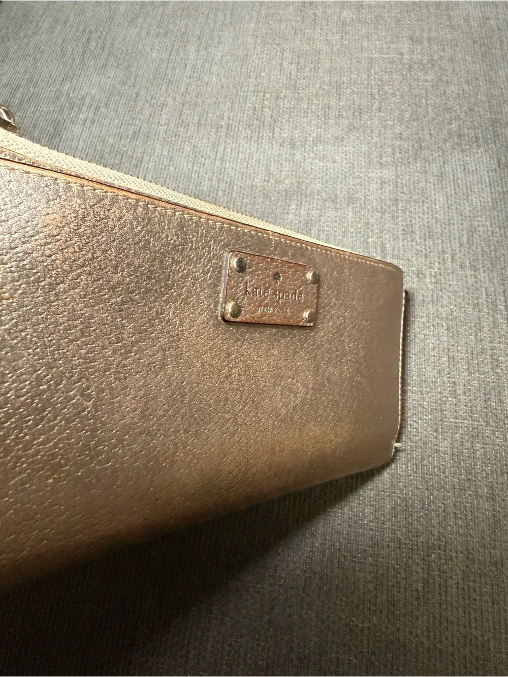 Kate spade Metallic Rose Gold Wristlet Wallet with Zip Closure